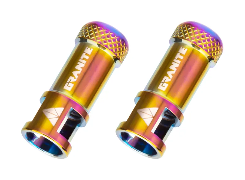 Granite Juicy Nipple Valve Cap and Removal Tool in Oil Slick